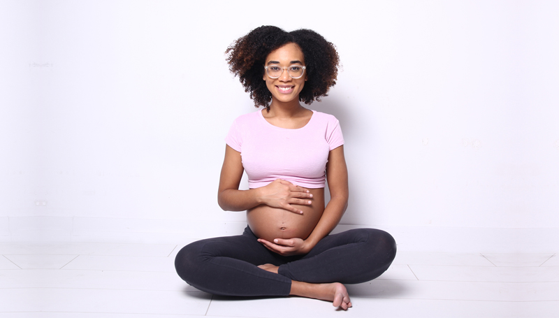 happy and healthy young pregnant woman